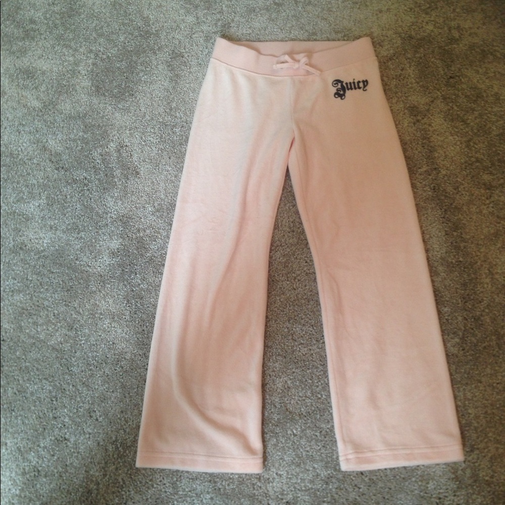 Juicy couture size 8 pink pnts with tag on it.